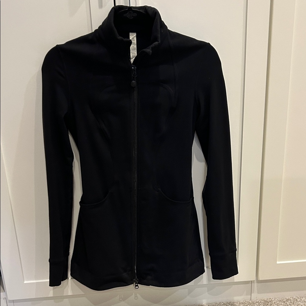 Lululemon Black long fitted Jacket. Size 4. Good condition.